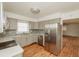 Updated kitchen featuring gray cabinets, stainless steel appliances and a stylish backsplash at 601 N Franklin St, Plant City, FL 33563