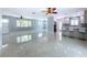 The spacious open floorplan living area is complemented by modern kitchen features at 6268 39Th N Ave, St Petersburg, FL 33709