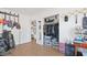 Spacious closet area with guitars, ample storage, and easy access to a full-length mirror at 6325 9Th S Ave, Gulfport, FL 33707