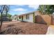 Charming single-story home featuring freshly mulched landscaping, decorative trim and a well-maintained wooden fence at 6325 9Th S Ave, Gulfport, FL 33707