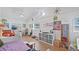 Bright living room features a vaulted ceiling, hardwood floors, and plenty of storage at 6325 9Th S Ave, Gulfport, FL 33707