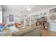 Bright living room with wood flooring, an open layout, and comfortable seating at 6325 9Th S Ave, Gulfport, FL 33707