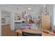 Open-concept living space with wood floors, natural light, and a view into the kitchen at 6325 9Th S Ave, Gulfport, FL 33707
