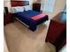 Comfortable bedroom featuring a queen size bed and natural light at 6325 Yellow Buckeye Dr, Riverview, FL 33578