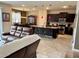 Spacious living room with an open floor plan that flows into a modern kitchen at 6325 Yellow Buckeye Dr, Riverview, FL 33578