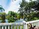 Picturesque pond view from the property featuring mature trees and lush greenery at 6429 Gulfport Blvd. South Blvd, South Pasadena, FL 33707