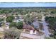 Aerial view of a neighborhood showcasing mature trees and residential homes at 7117 Wrenwood Cir, Tampa, FL 33617