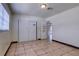 Bedroom featuring tile floors, closet and door leading to another room at 7117 Wrenwood Cir, Tampa, FL 33617