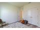 A clean and modern bedroom with ample closet space and neutral decor; perfect for relaxation at 7154 Steer Blade Dr, Zephyrhills, FL 33541
