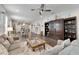Spacious open-concept layout seamlessly connecting the living room, dining area and kitchen, perfect for entertaining at 7423 Sungold Meadow Ct, Apollo Beach, FL 33572