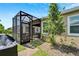 Covered patio perfect for outdoor dining, relaxation and barbeques at 7423 Sungold Meadow Ct, Apollo Beach, FL 33572