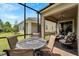 Covered patio and backyard, excellent for relaxing and entertaining at 7423 Sungold Meadow Ct, Apollo Beach, FL 33572