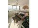 Sunlit bedroom showcasing a unique bed frame, stylish decor, and cozy ambiance, perfect for relaxation at 7465 Bay Island S Dr # 312, South Pasadena, FL 33707
