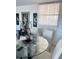 Chic dining space featuring a glass table, stylish decor, and elegant accents, creating a refined atmosphere at 7465 Bay Island S Dr # 312, South Pasadena, FL 33707