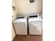 Community laundry room with two Speed Queen commercial dryer machines for residents use at 7465 Bay Island S Dr # 312, South Pasadena, FL 33707