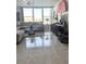 Bright living room featuring water views, comfortable seating, and stylish decor, creating a cozy and inviting space at 7465 Bay Island S Dr # 312, South Pasadena, FL 33707