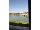 Scenic water view from window overlooking a bridge and lush greenery, inviting relaxation and tranquility at 7465 Bay Island S Dr # 312, South Pasadena, FL 33707
