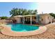 Private backyard oasis with a beautiful pool, covered patio, and ample space for outdoor entertaining at 8039 83Rd N St, Seminole, FL 33777