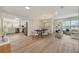 Open dining area with modern chandelier, seamlessly connected to the kitchen, ideal for entertaining and Gathering meals at 918 Skyview Dr, Brandon, FL 33510