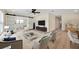 Comfortable living room with a ceiling fan and sliding barn doors, providing a cozy and stylish atmosphere at 918 Skyview Dr, Brandon, FL 33510
