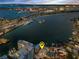 Waterfront home with dock, boat lift, and expansive views of the bay and marina at 94 Devon Dr, Clearwater Beach, FL 33767