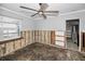 Bedroom with large windows awaiting remodel, bright space with potential for customization at 94 Devon Dr, Clearwater Beach, FL 33767
