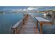 Charming waterfront dock offers stunning views and easy access to the serene waterway at 94 Devon Dr, Clearwater Beach, FL 33767