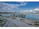 Charming waterfront dock offers stunning views and easy access to the serene waterway at 94 Devon Dr, Clearwater Beach, FL 33767
