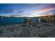 Waterfront home featuring a private dock with boat mooring in a serene bay setting at 94 Devon Dr, Clearwater Beach, FL 33767