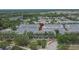 Charming townhomes in a well-maintained community with lush landscaping and a nearby pond at 9506 Harpender Way, Tampa, FL 33626