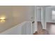Upper hallway with wood floors at 9506 Harpender Way, Tampa, FL 33626
