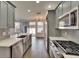 Well-appointed kitchen with stainless steel appliances and an open view to the living area at 9506 Harpender Way, Tampa, FL 33626