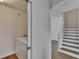 Convenient laundry room with a washer and dryer, located near the stairs at 9506 Harpender Way, Tampa, FL 33626