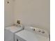 Bright laundry room with modern appliances at 9506 Harpender Way, Tampa, FL 33626