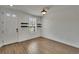Spacious living room with wood-look floors and recessed lighting at 9506 Harpender Way, Tampa, FL 33626