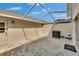 Screened-in patio with brick flooring and access to a backyard at 9506 Harpender Way, Tampa, FL 33626