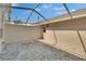 Private, covered patio with brick flooring, offering a peaceful outdoor space at 9506 Harpender Way, Tampa, FL 33626