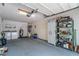 Spacious garage with washer, dryer, water heater and ample storage shelves and plenty of room at 9812 N Pawnee Ave, Tampa, FL 33617