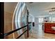 Bright kitchen features stainless steel appliances, wooden cabinets, and wood-look flooring at 1041 Persimmon Dr, Palm Harbor, FL 34683
