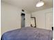 This bright bedroom features clean white walls and access to a walk-in closet at 1115 Rue Des Chateaux # 2B, South Pasadena, FL 33707