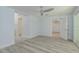 Bedroom with wood floors and ceiling fan at 1152 Jackmar Rd, Dunedin, FL 34698