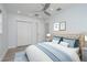 Stylishly furnished bedroom with a closet, new floors and recessed lighting at 1152 Jackmar Rd, Dunedin, FL 34698
