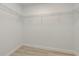 Walk in closet with shelves at 1152 Jackmar Rd, Dunedin, FL 34698