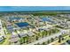 Beautiful aerial of a neighborhood with mature trees and lovely lakes at 11707 Sunburst Marble Rd, Riverview, FL 33579
