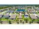 Aerial view of a house in a Gathering-friendly neighborhood complete with lakes and playgrounds at 11707 Sunburst Marble Rd, Riverview, FL 33579