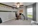 Bedroom with a neutral color scheme, carpeted floors, and a window bringing in natural light at 11707 Sunburst Marble Rd, Riverview, FL 33579