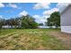 Image showcasing the outdoor space next to the home with green utility access covers at 16137 Melbourne St, Brooksville, FL 34604