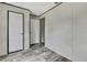 Bedroom featuring a closet and an entry door at 16137 Melbourne St, Brooksville, FL 34604