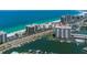 Aerial view of beachfront high-rise condo building with boat docks and ocean views at 1621 Gulf Blvd # 1604, Clearwater Beach, FL 33767