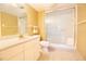 Bright bathroom with updated fixtures, a walk-in shower, and a modern vanity at 1621 Gulf Blvd # 1604, Clearwater Beach, FL 33767